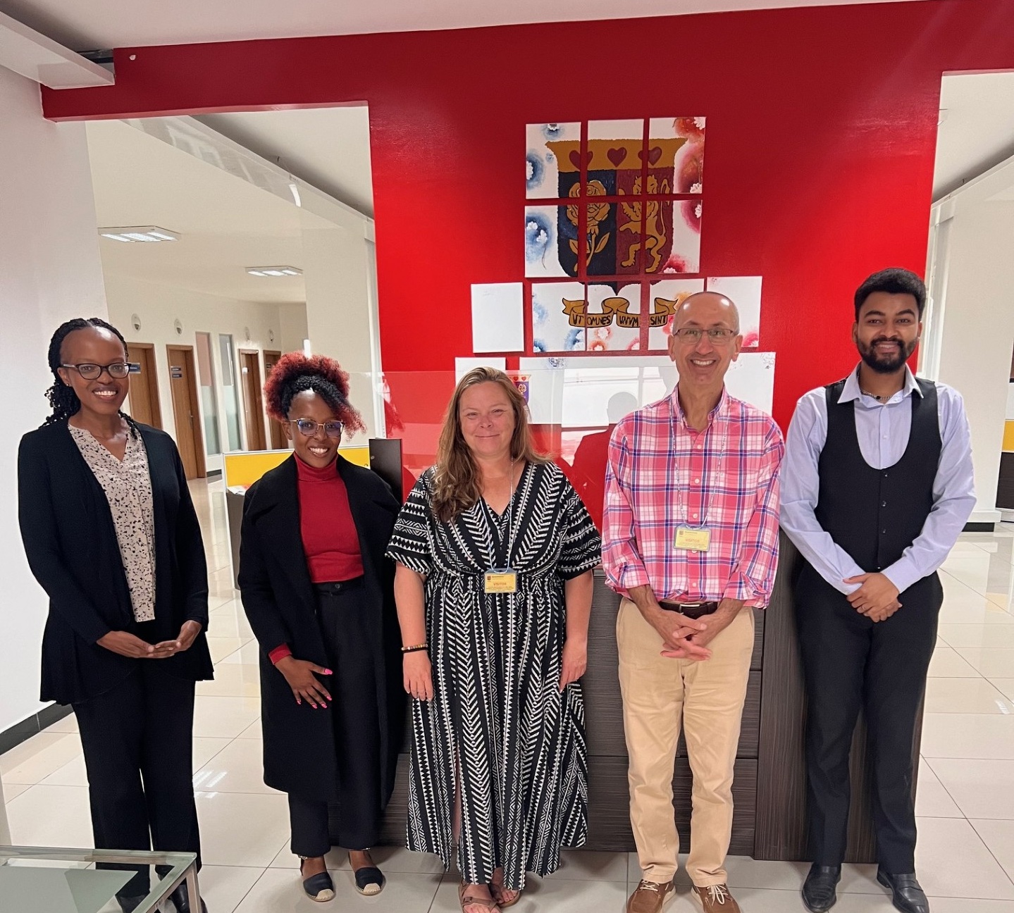 At Strathmore University Law School, with Dr. Lynette Osiemo, Research Director; Wendy Nyakweba, Graduate Assistant, Research; and Malcolm Melita Kibati, Graduate Assistant, Partnerships