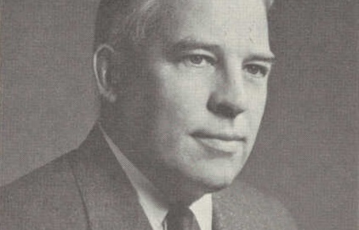 Yellowed photograph of a man in a suit