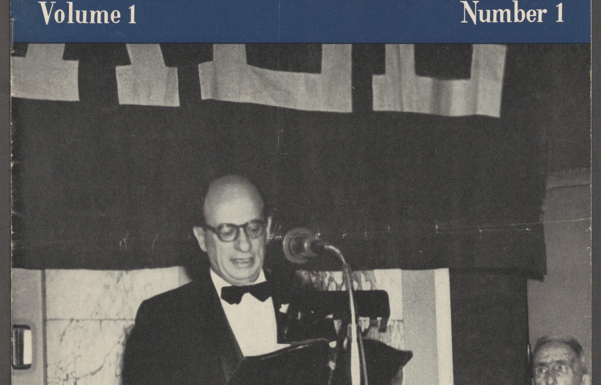 Cover of a magazine with the text "Yale Law Report", fron timage is of a man in a tuxedo speaking at a microphone